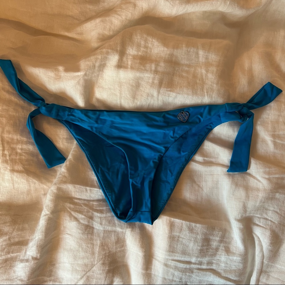 ROYAL BLUE BODY GLOVE BIKINI BOTTOMS. Medium coverage with adjustable ties.